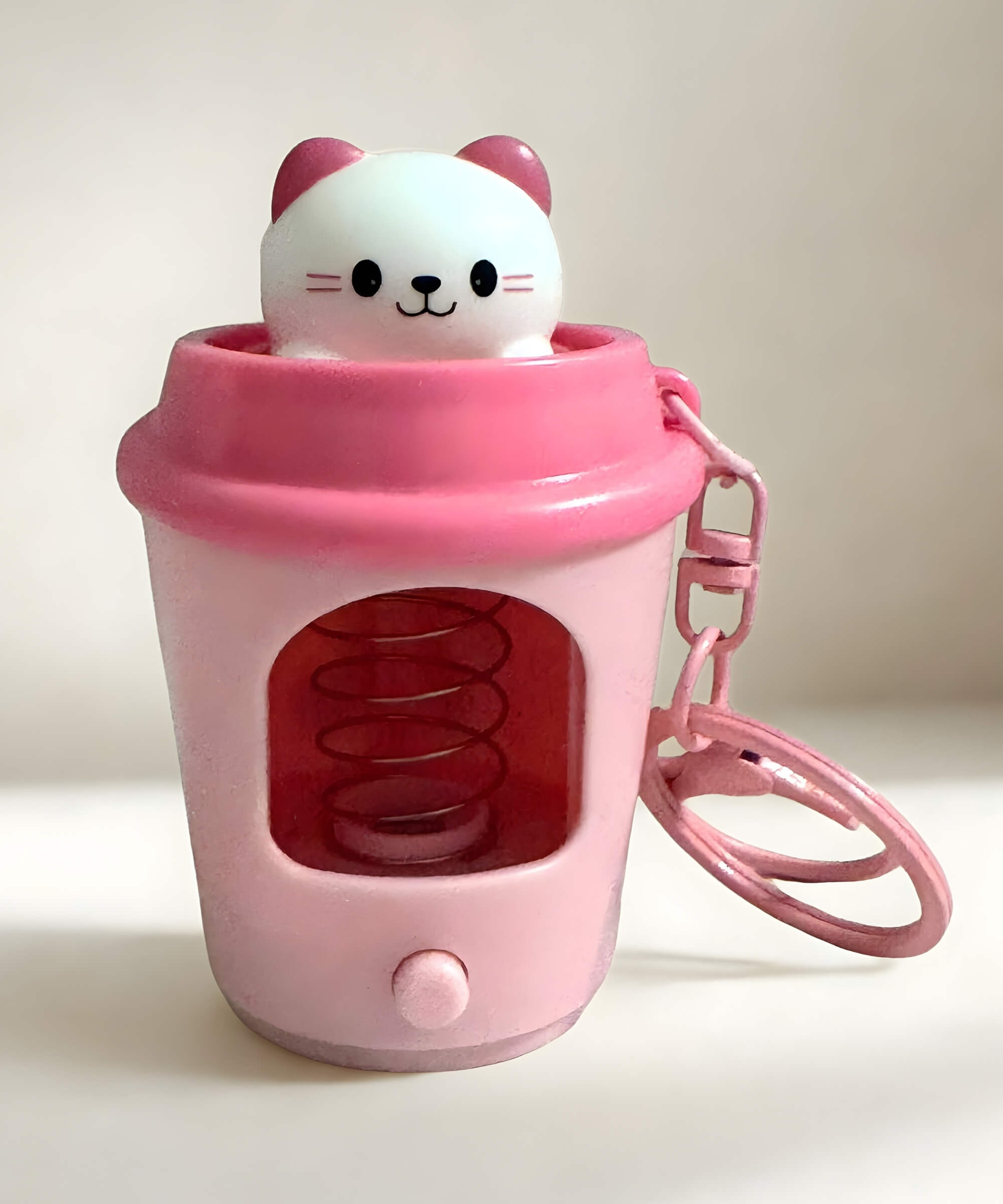 Cat pop-up coffee cup LED keychain light-up spring animal bag charm pink